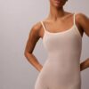 Body minimalista in rete a metà coscia Body minimalista in rete a metà coscia