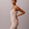 Body minimalista in rete a metà coscia Body minimalista in rete a metà coscia