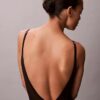 Body minimalista in rete a metà coscia Body minimalista in rete a metà coscia