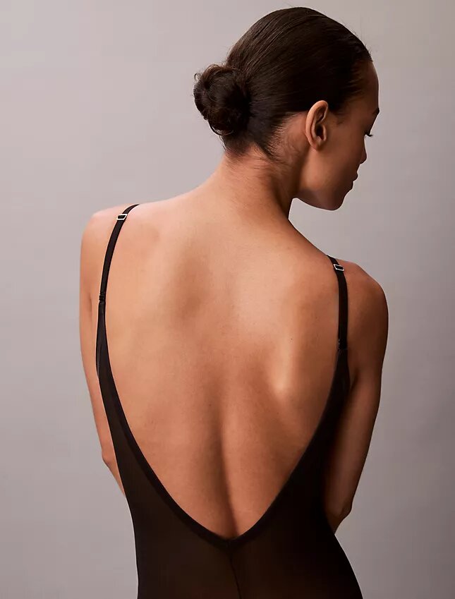 Body minimalista in rete a metà coscia Body minimalista in rete a metà coscia