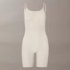 Body minimalista in rete a metà coscia Body minimalista in rete a metà coscia