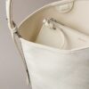 Borsa a secchiello con logo su tutta la superficie e pochette Borsa a secchiello con logo su tutta la superficie e pochette