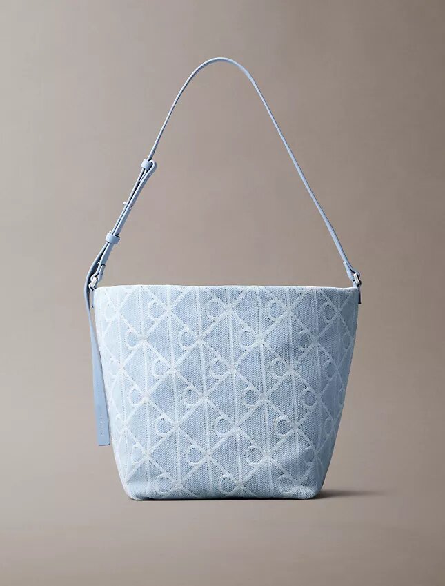 Borsa a secchiello in Denim con logo Emblem su tutta la superficie Borsa a secchiello in Denim con logo Emblem su tutta la superficie
