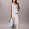 Borsa a secchiello in Denim con logo Emblem su tutta la superficie Borsa a secchiello in Denim con logo Emblem su tutta la superficie