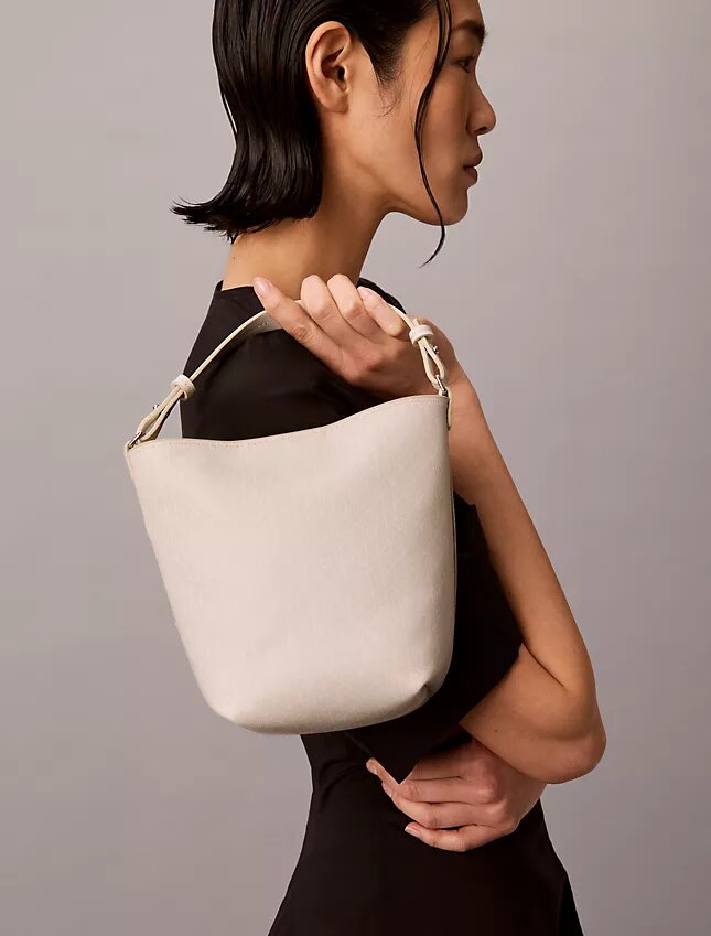 Borsa a secchiello piccola con logo su tutta la superficie e pochette Borsa a secchiello piccola con logo su tutta la superficie e pochette