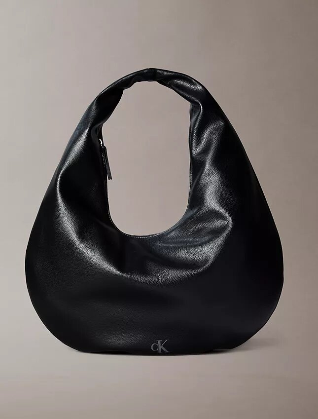 Borsa a tracolla a mezzaluna con finitura martellata Borsa a tracolla a mezzaluna con finitura martellata