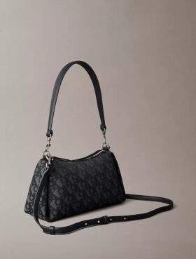 Borsa a tracolla con logo Monogram a pieghe