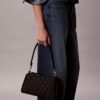 Borsa a tracolla con logo Monogram a pieghe Borsa a tracolla con logo Monogram a pieghe