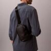 Borsa a tracolla con logo su tutta la superficie Borsa a tracolla con logo su tutta la superficie