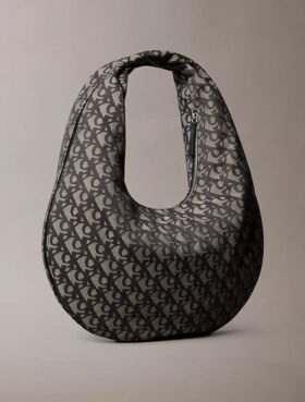 Borsa a tracolla con motivo Monogram a mezzaluna