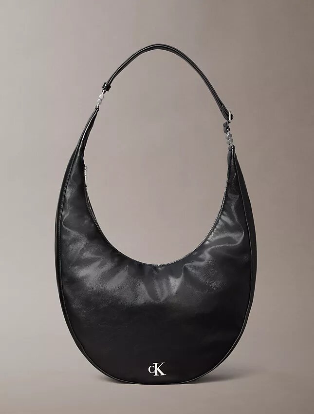 Borsa a tracolla convertibile dalla forma arrotondata Borsa a tracolla convertibile dalla forma arrotondata