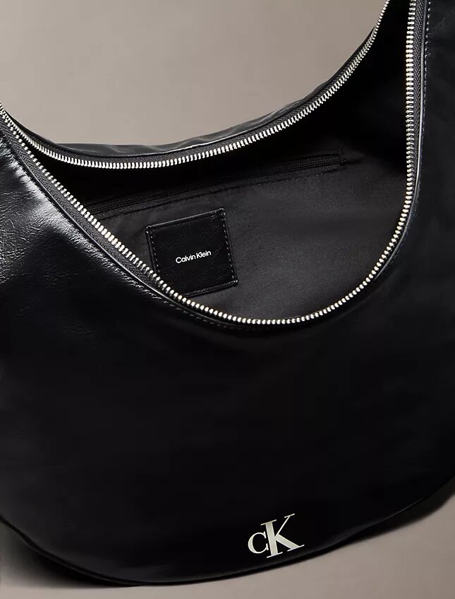 Borsa a tracolla convertibile dalla forma arrotondata Borsa a tracolla convertibile dalla forma arrotondata
