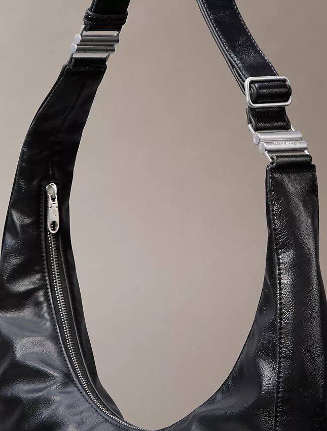 Borsa a tracolla convertibile dalla forma arrotondata Borsa a tracolla convertibile dalla forma arrotondata