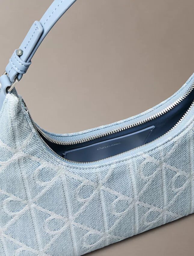 Borsa a tracolla in Denim con logo su tutta la superficie Borsa a tracolla in Denim con logo su tutta la superficie