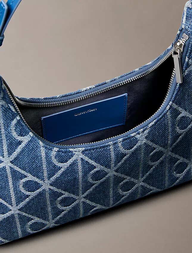 Borsa a tracolla in Denim con logo su tutta la superficie Borsa a tracolla in Denim con logo su tutta la superficie