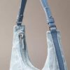 Borsa a tracolla in Denim con logo su tutta la superficie Borsa a tracolla in Denim con logo su tutta la superficie