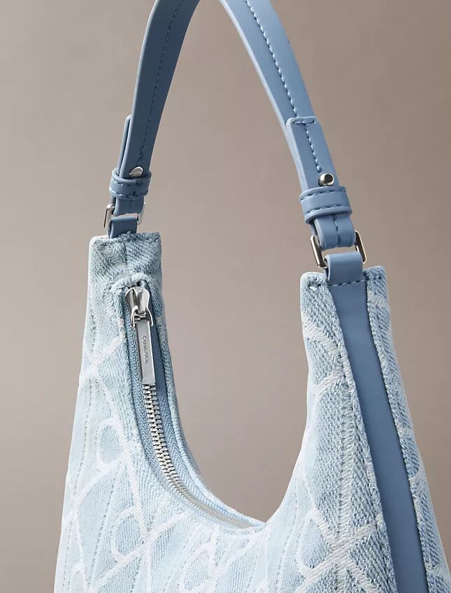 Borsa a tracolla in Denim con logo su tutta la superficie Borsa a tracolla in Denim con logo su tutta la superficie