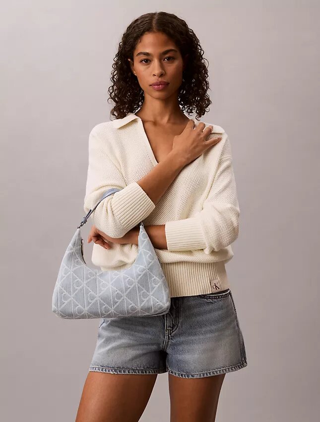 Borsa a tracolla in Denim con logo su tutta la superficie Borsa a tracolla in Denim con logo su tutta la superficie