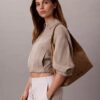 Borsa a tracolla in jacquard con emblema Borsa a tracolla in jacquard con emblema