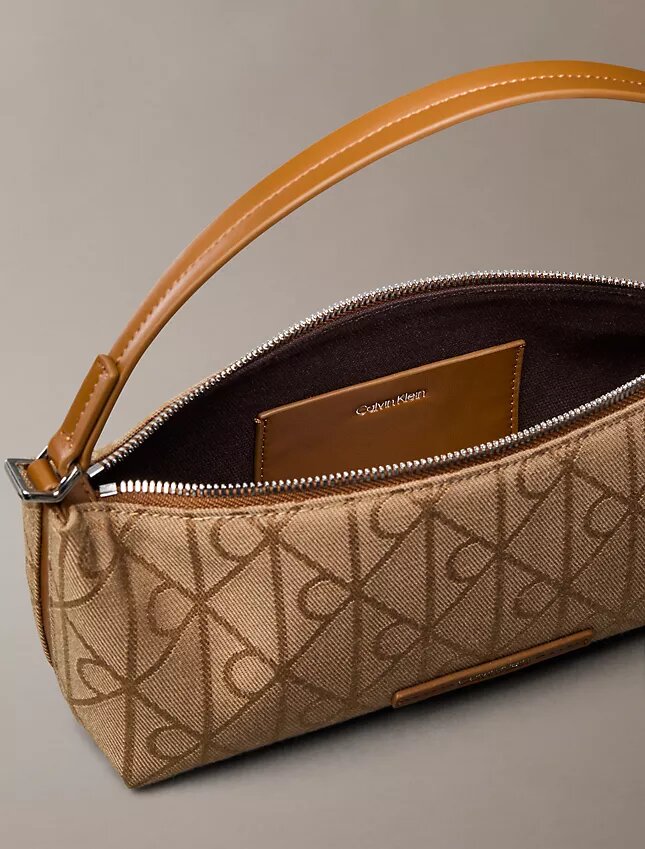 Borsa a tracolla in tela con logo su tutta la superficie Borsa a tracolla in tela con logo su tutta la superficie