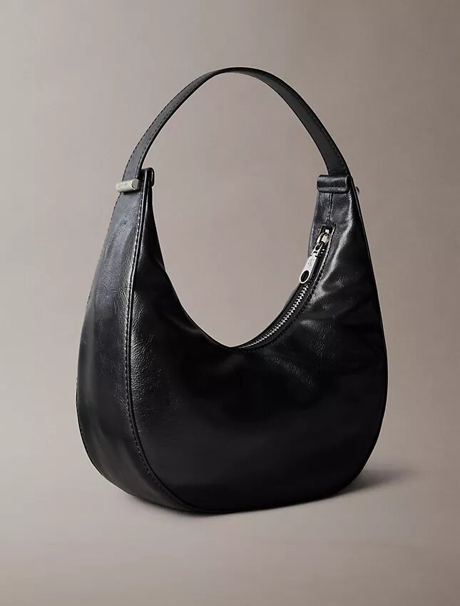 Borsa a tracolla piccola convertibile dalla forma arrotondata Borsa a tracolla piccola convertibile dalla forma arrotondata