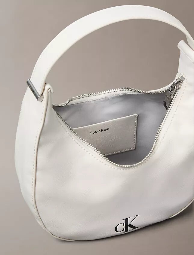Borsa a tracolla piccola convertibile dalla forma arrotondata Borsa a tracolla piccola convertibile dalla forma arrotondata