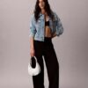 Borsa a tracolla piccola convertibile dalla forma arrotondata Borsa a tracolla piccola convertibile dalla forma arrotondata