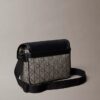Borsa a tracolla piccola in jacquard con emblema Borsa a tracolla piccola in jacquard con emblema