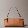 Borsa convertibile piccola in pelle morbida Borsa convertibile piccola in pelle morbida
