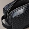 Borsa da toilette con cerniera e logo su tutta la superficie