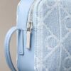 Borsa fotografica in Denim con logo su tutta la superficie Borsa fotografica in Denim con logo su tutta la superficie