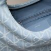 Borsa Hobo in Denim con logo emblema su tutta la superficie Borsa Hobo in Denim con logo emblema su tutta la superficie