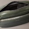 Borsa per fotocamera con logo in rilievo su tutta la superficie