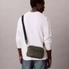 Borsa per fotocamera con logo in rilievo su tutta la superficie
