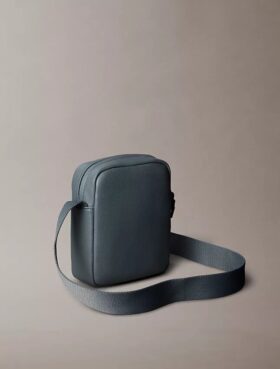 Borsa Reporter con texture granulata