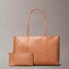 Borsa tote con logo Emblem traforato Borsa tote con logo Emblem traforato