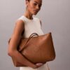 Borsa tote con logo Emblem traforato Borsa tote con logo Emblem traforato
