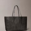 Borsa tote grande con logo emblema su tutta la superficie e tasca interna Borsa tote grande con logo emblema su tutta la superficie e tasca interna