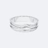 Bracciale rigido con forma fluida e scultorea
