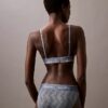 Bralette triangolare leggermente foderata in pizzo moderno Bralette triangolare leggermente foderata in pizzo moderno