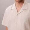 Camicia button-down a maniche corte in lino e cotone Camicia button-down a maniche corte in lino e cotone