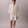 Camicia button-down a maniche corte in lino e cotone Camicia button-down a maniche corte in lino e cotone