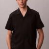 Camicia button-down a maniche corte in lino e cotone Camicia button-down a maniche corte in lino e cotone