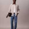 Camicia button-down dal taglio morbido a righe in misto viscosa e nylon Camicia button-down dal taglio morbido a righe in misto viscosa e nylon
