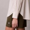 Camicia button-down dal taglio morbido in popeline di cotone a righe Camicia button-down dal taglio morbido in popeline di cotone a righe