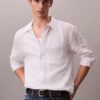 Camicia button-down dalla vestibilità comoda con righe stinte in filo e effetto stropicciato Camicia button-down dalla vestibilità comoda con righe stinte in filo e effetto stropicciato