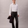 Camicia button-down dalla vestibilità comoda in misto viscosa a righe Camicia button-down dalla vestibilità comoda in misto viscosa a righe
