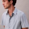 Camicia classica elasticizzata a righe tinte in filo Camicia classica elasticizzata a righe tinte in filo