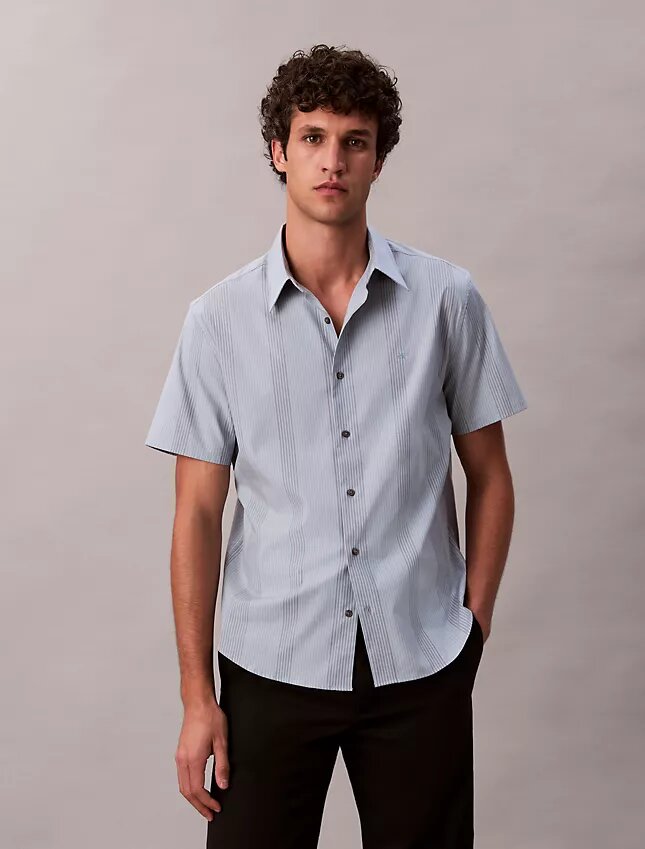 Camicia classica elasticizzata a righe tinte in filo Camicia classica elasticizzata a righe tinte in filo