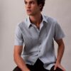 Camicia classica elasticizzata a righe tinte in filo Camicia classica elasticizzata a righe tinte in filo